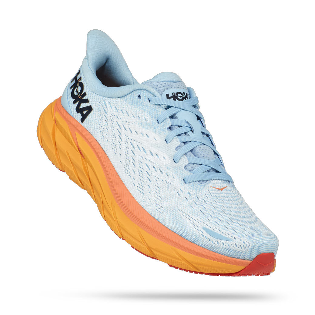 A light blue Hoka Clifton 8 Summer Song/Ice Flow running shoe with a thick orange sole and the hoka brand logo displayed on the side, featuring a responsive midsole.