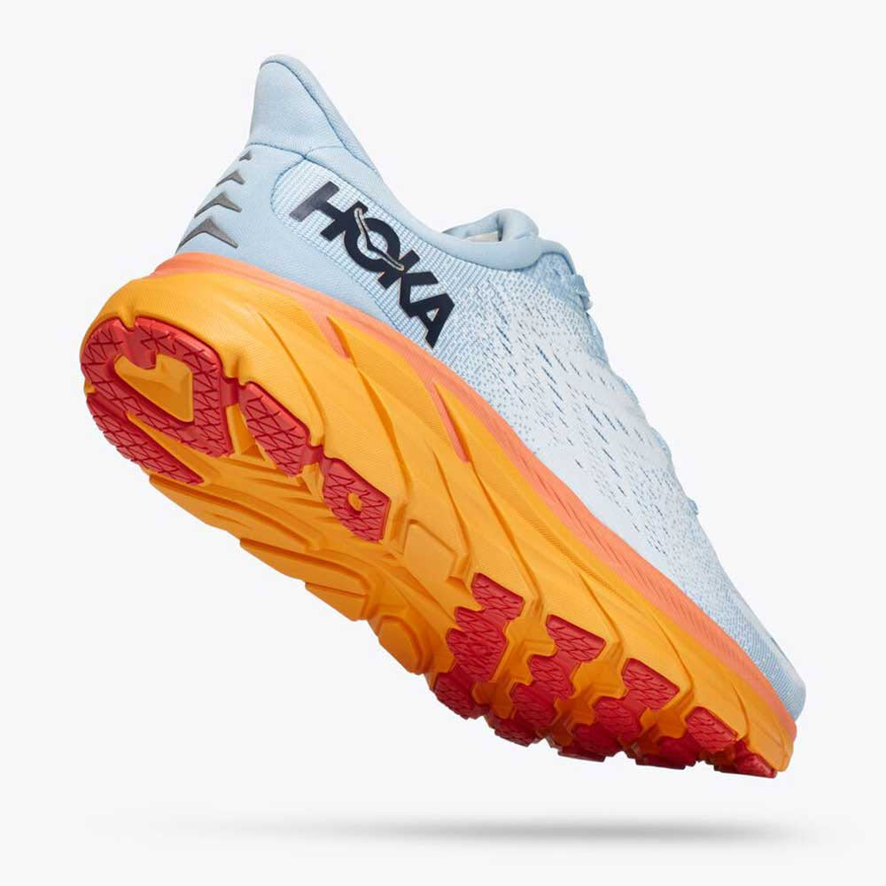 Side view of a blue and orange Hoka Clifton 8 running shoe with thick cushioning.