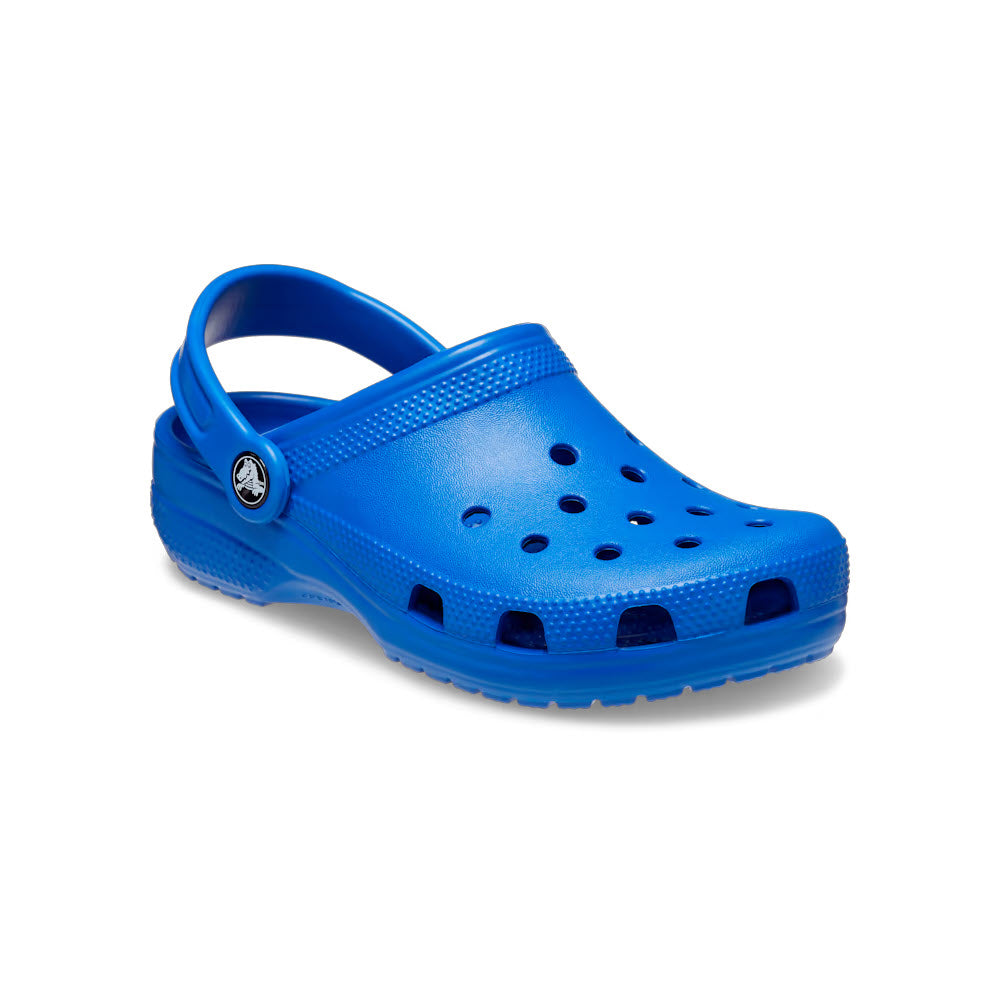 A single bright blue Crocs Classic Clog Kids Blue Bolt, with circular ventilation holes and a pivoting heel strap, displayed on a white background.