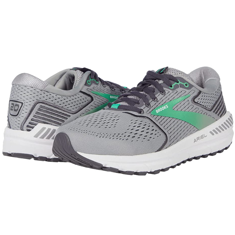 A pair of Brooks Ariel 20 Alloy/Green women&#39;s running shoes, stability trainer, in gray and green colors.