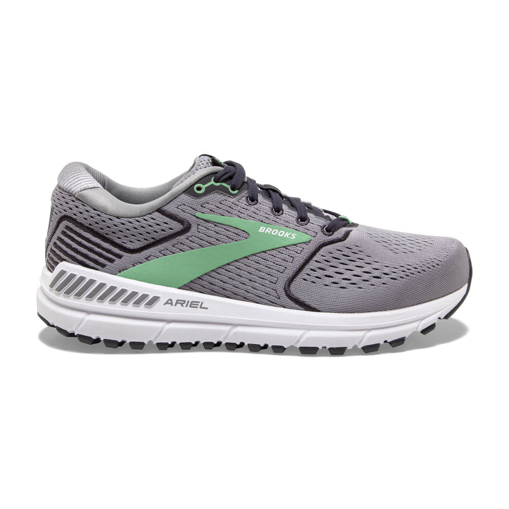 A single gray Brooks Ariel 20 Alloy/Green stability trainer for women with a white sole and green accents.