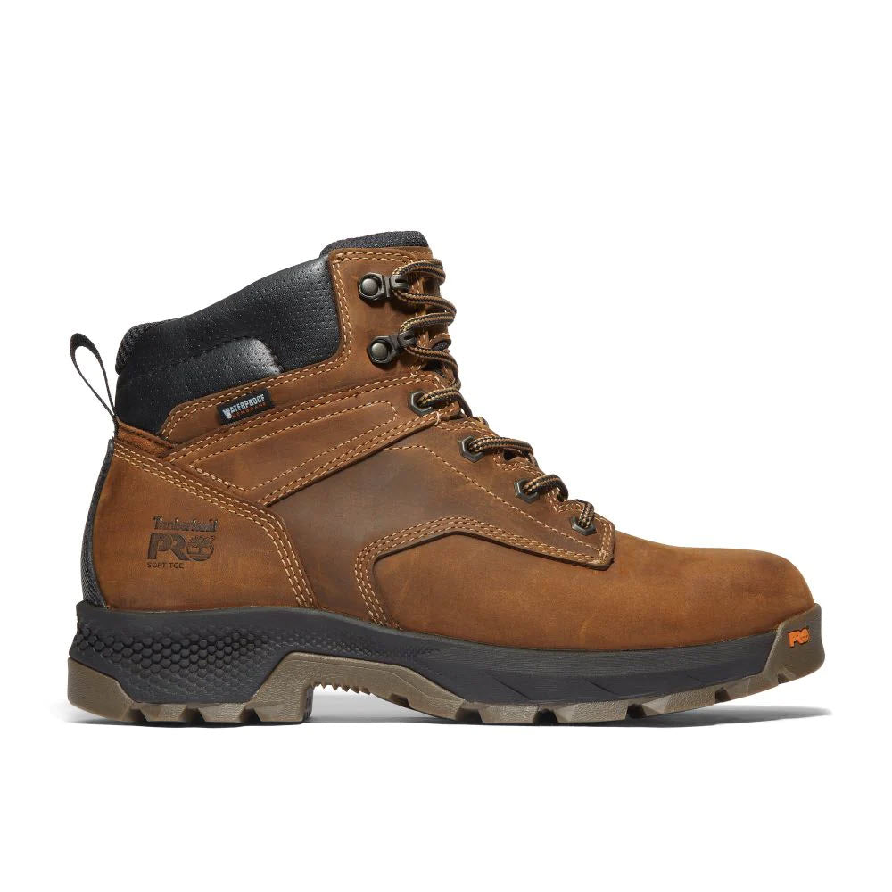 Brown leather Timberland Timberland Titan EV 6&quot; WP Soft Toe Earth work boot with black padding around the ankle, metal eyelets, and a rugged rubber sole.