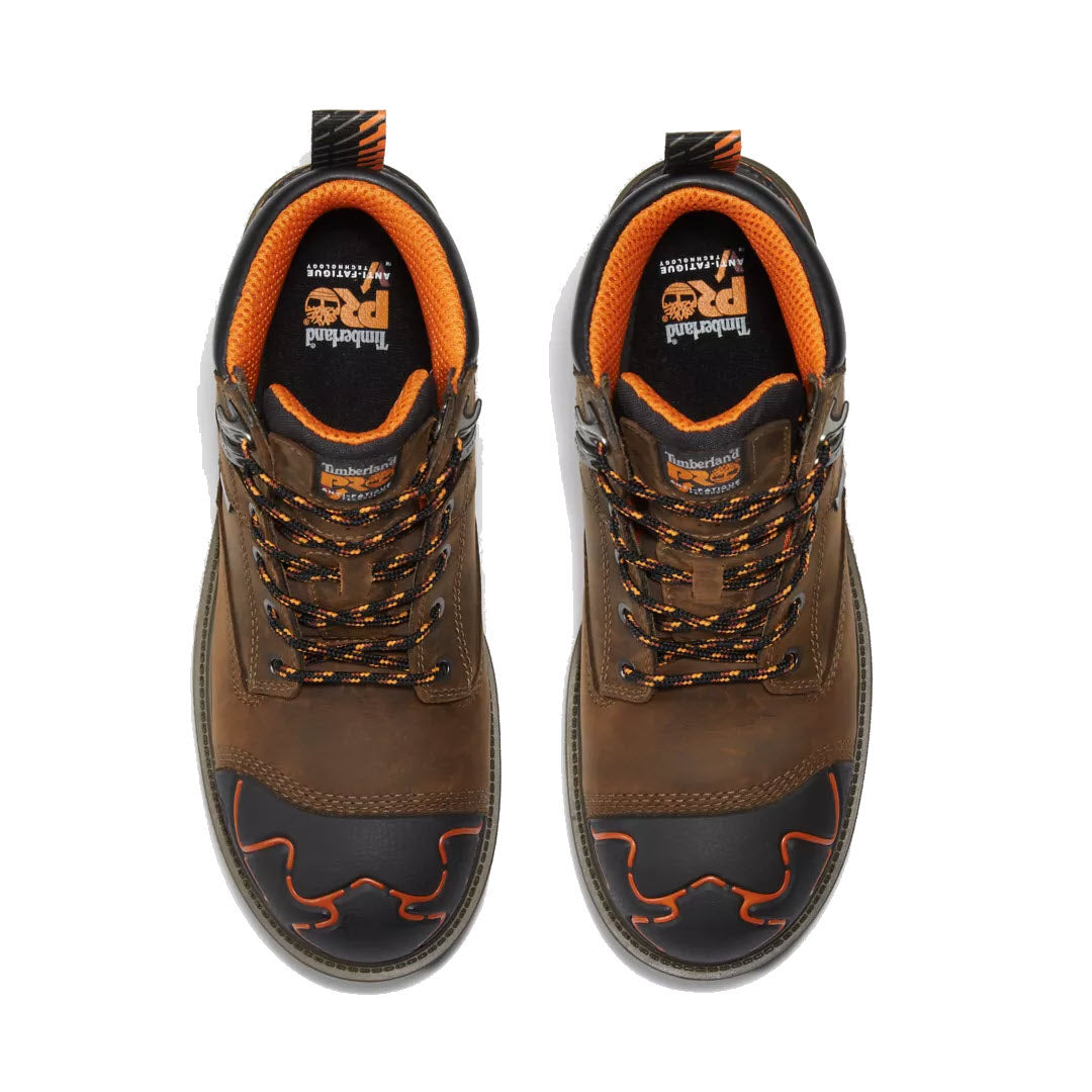 Top view of a pair of Timberland CT Magnitude 6&quot; WP Mocha - Mens industrial brown hiking boots with orange and black laces.