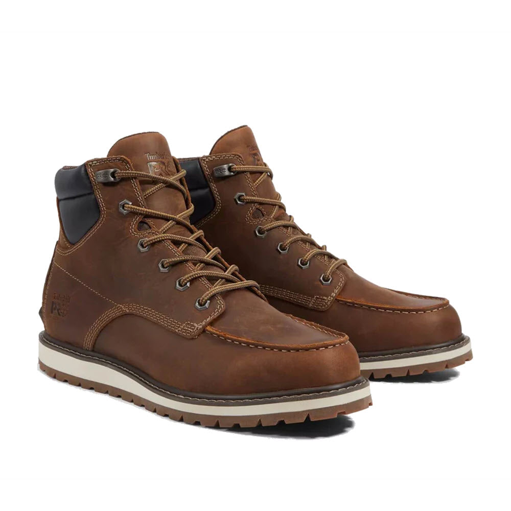 A pair of brown full-grain leather Timberland Irvine Wedge 6&quot; Soft Toe - Mens boots against a white background.