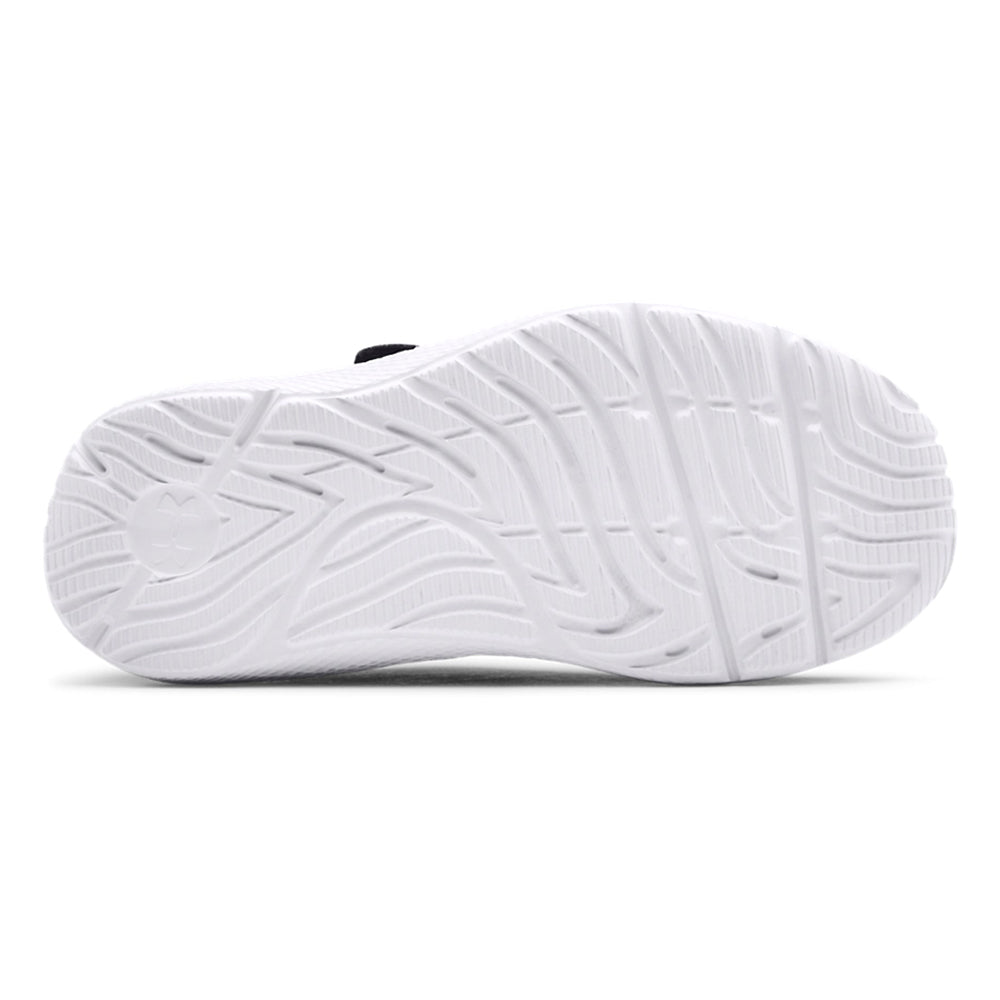White rubber sole of an Under Armour athletic shoe with tread pattern design, featuring lightweight cushioning.