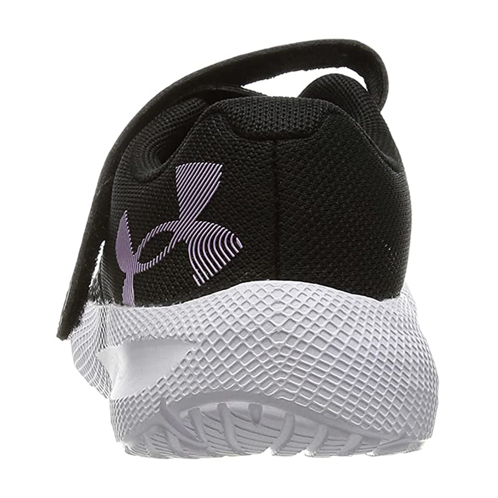Rear view of a black and white Under Armour Pursuit 2 AC kids athletic shoe displaying its tread and logo with lightweight cushioning.