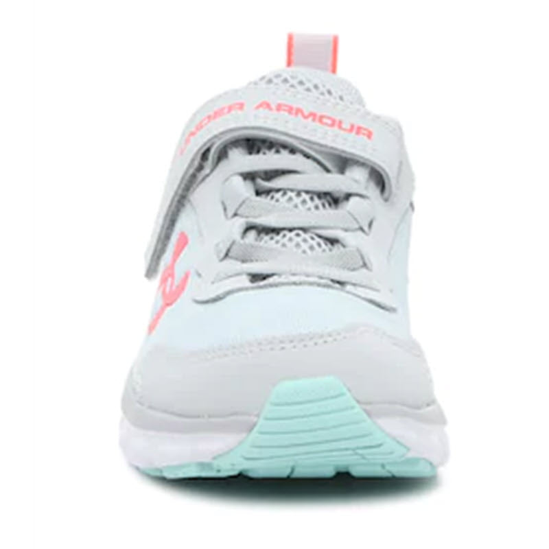 Front view of a kid&#39;s Under Armour Assert 9 Grey athletic shoe with lightweight mesh upper, gray accents, and coral branding.