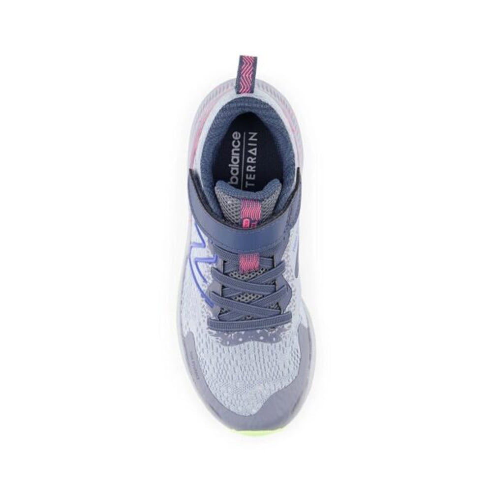 Top view of a gray and blue New Balance DynaSoft Nitrel V5 AC Starlight - Kids running shoe with visible brand markings and a neon heel accent.