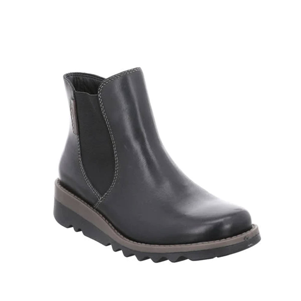 Black leather Rieker Lug Sole Chelsea ankle boot with interior support technology and a rugged sole on a white background.