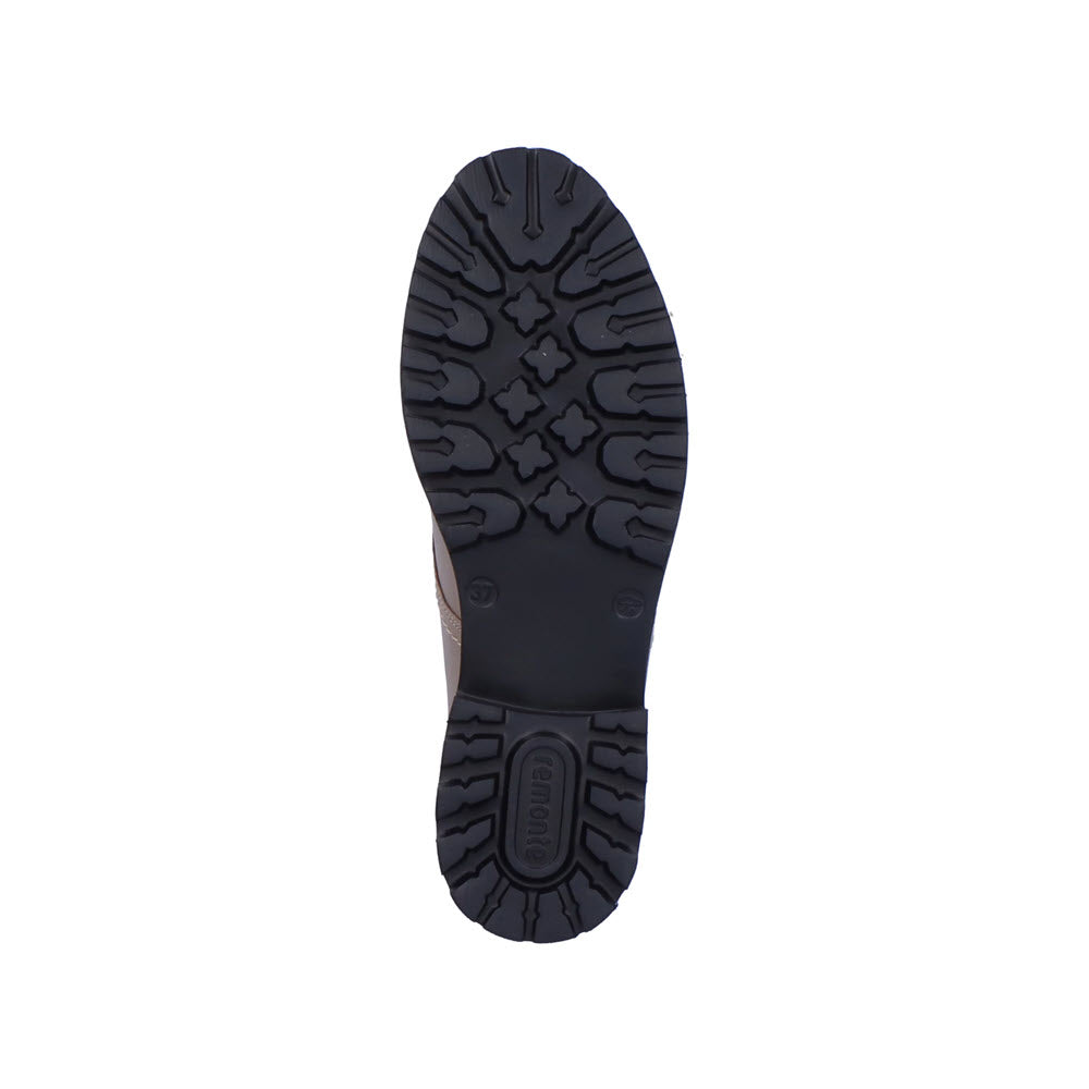 Sole of a Remonte shoe with black tread pattern and logo, displayed against a white background.