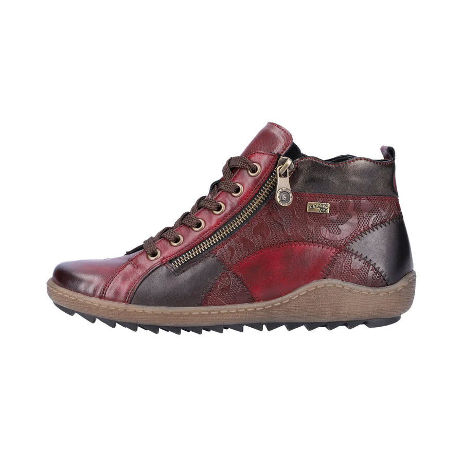 A red-brown Remonte Mixed Material High Top Wine Combi leather ankle boot with laces and a side zipper on a white background.