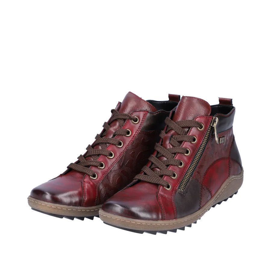 A pair of red leather high-top Remonte MIXED MATERIAL HIGH TOP WINE COMBI sneakers isolated on a white background.
