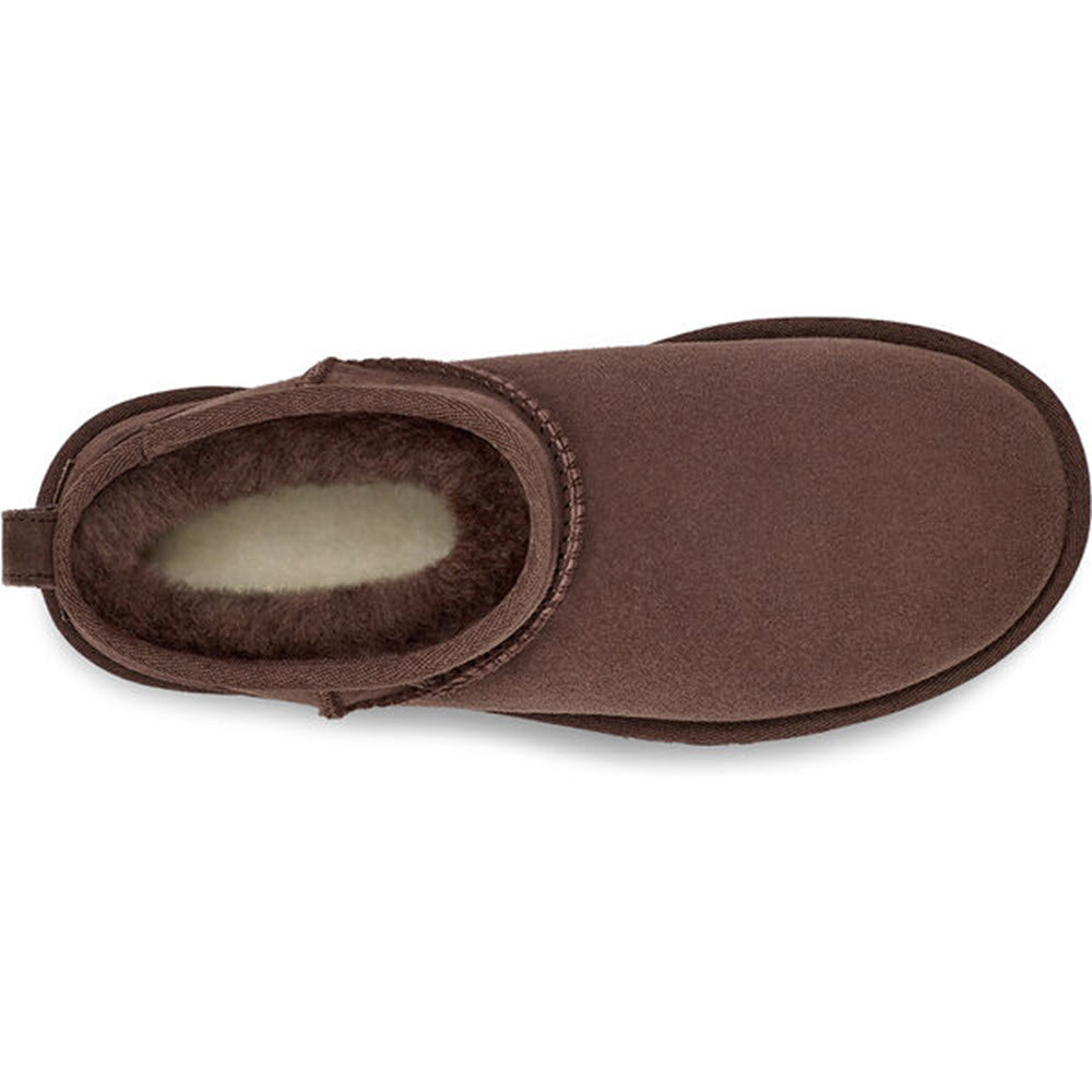 A single brown UGG CLASSIC ULTRA MINI BURNT CEDAR boot with a soft UGGplush lining and an ultra-short shaft on a white background.