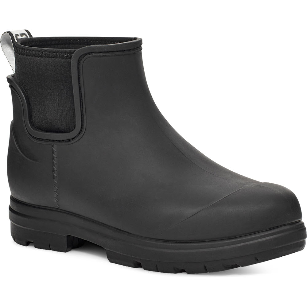 Sentence with replaced product: Black ankle-high Ugg Droplet Chelsea boot with elastic side panels.