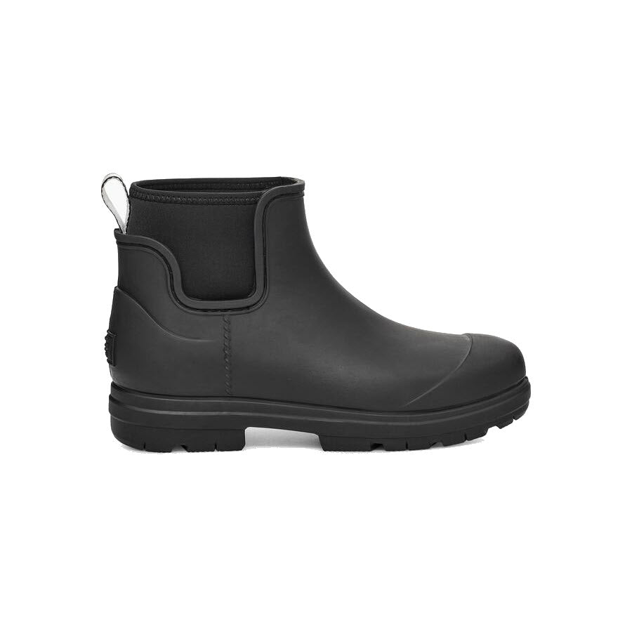 Black ankle-height UGG DROPLET BLACK - WOMENS waterproof rainboot against a white background.