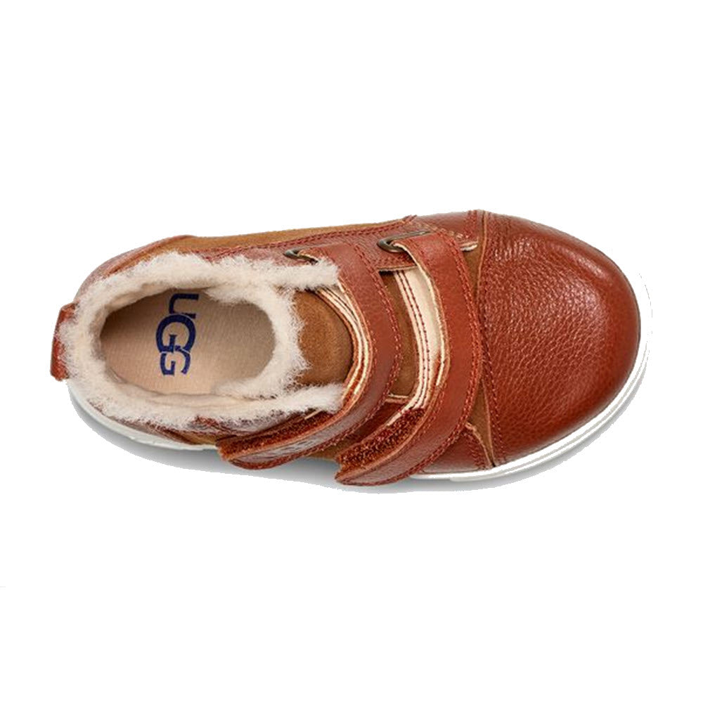 A single UGG Rennon II Weather Chestnut - Kids toddler shoe with hook-and-loop closures and a white sole.