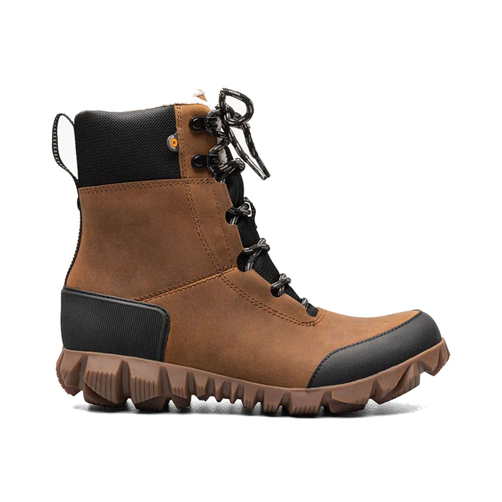 A sturdy brown Bogs Arcata leather caramel hiking boot with black accents, waterproof leather uppers, and rugged tread.