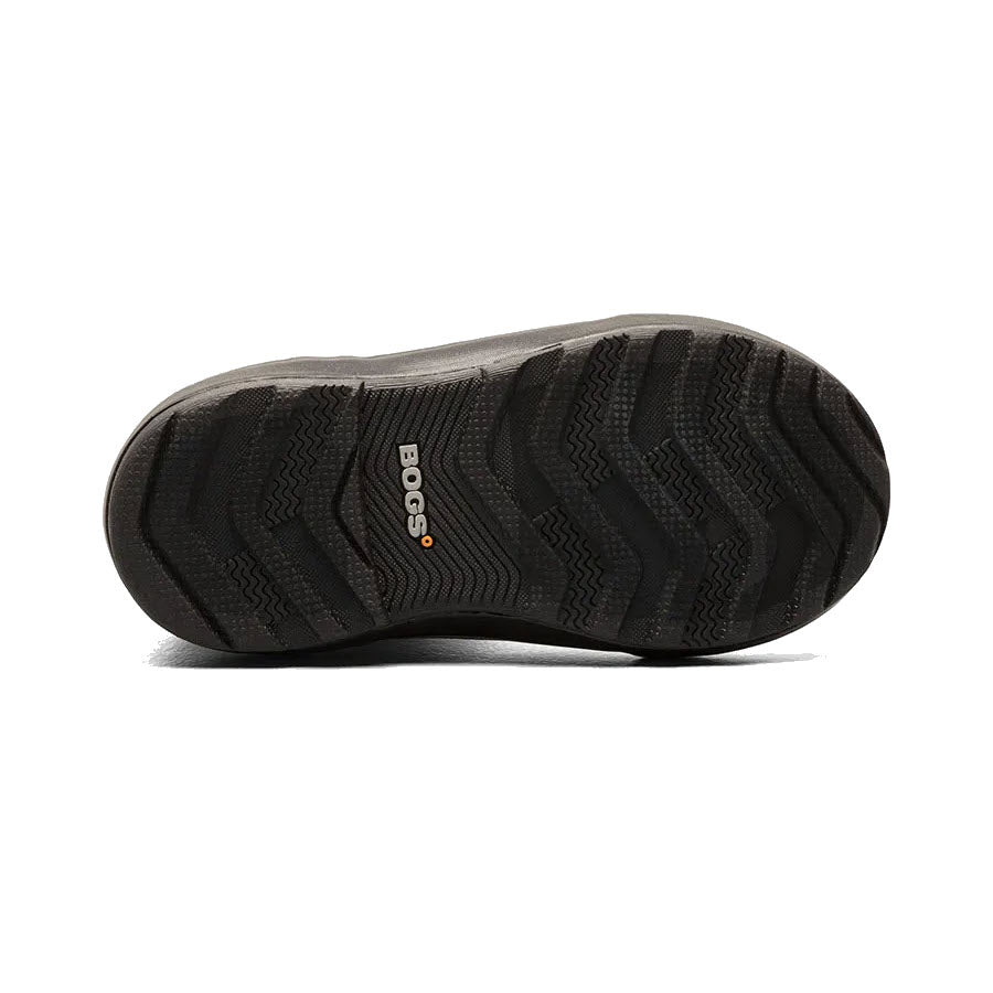 Tread pattern of a Bogs Classic II Mushrooms Black Multi kids-branded sole with 100% waterproof insulation on a white background.
