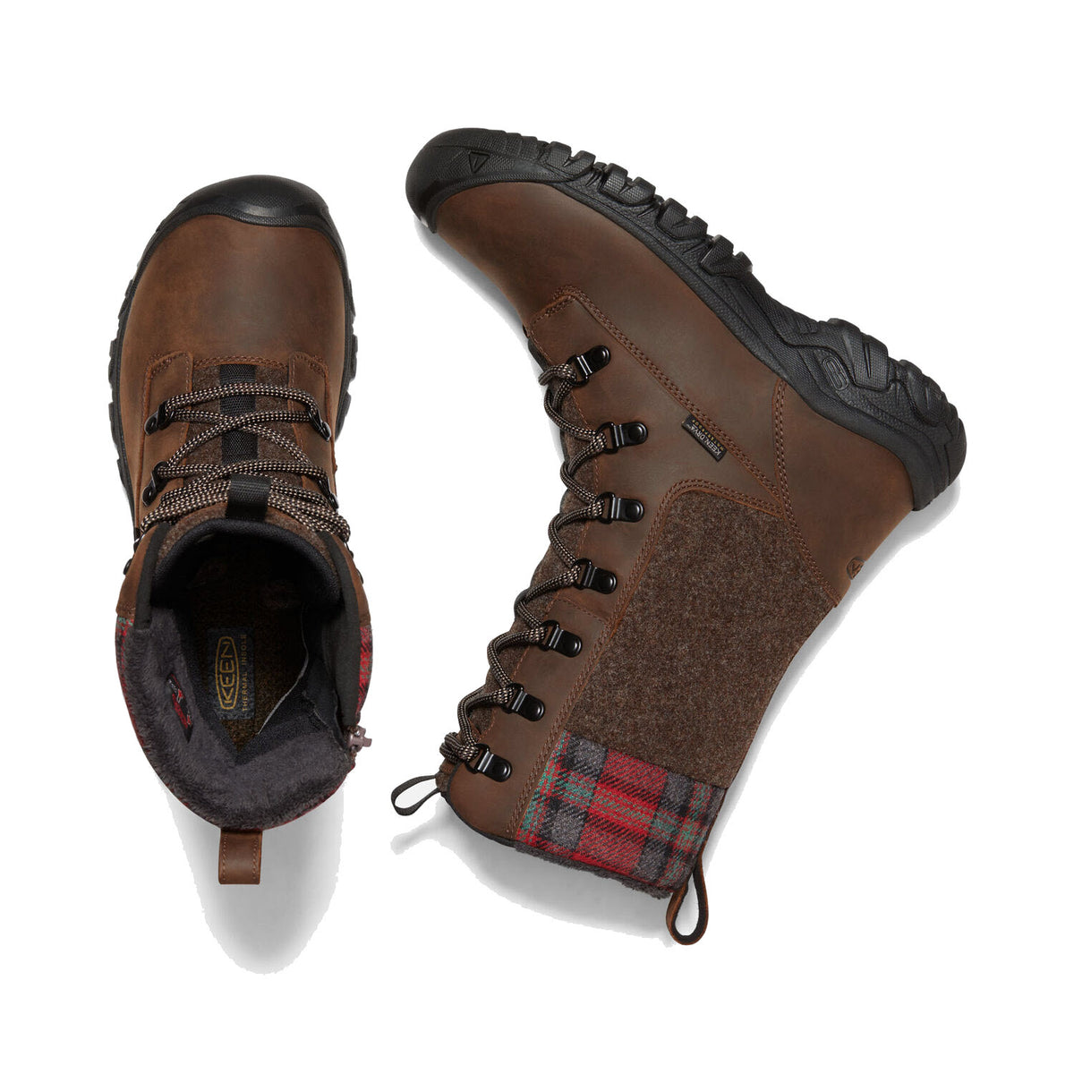 A pair of KEEN GRETA TALL BOOT BROWN - WOMENS with KEEN.DRY membrane and plaid detailing, viewed from above, isolated on a white background.