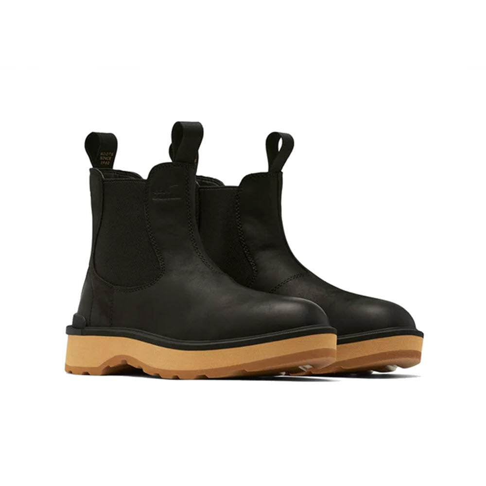 A pair of black waterproof leather Sorel Hi-Line Chelsea boots with elastic side panels and thick tan rubber soles, shown on a white background.