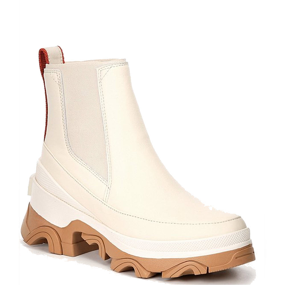 White waterproof Sorel Brex Chelsea boot with brown outsole and rear pull loop.