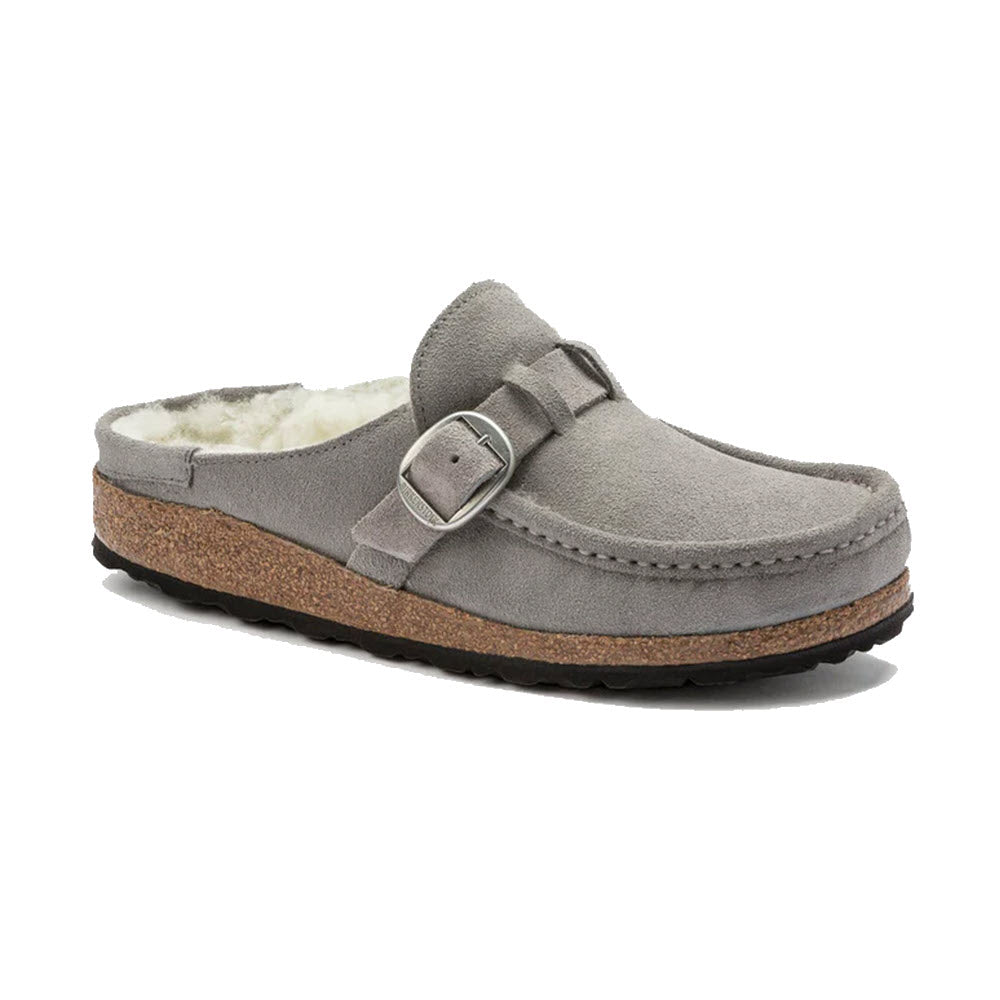 A single Birkenstock Buckley Shearling Stone Coin suede leather shearling-lined clog with a buckle detail.