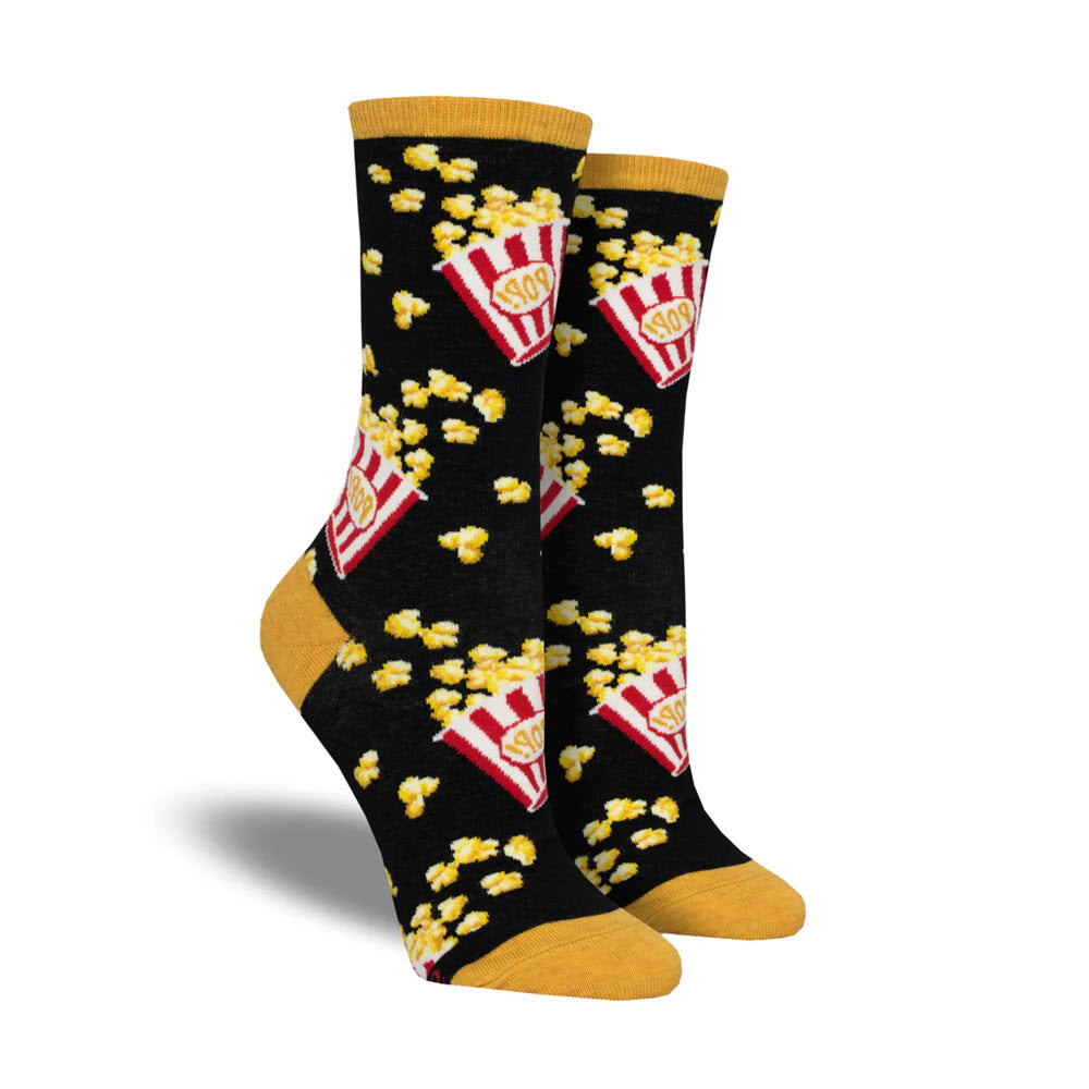 A pair of Socksmith women&#39;s Classic Popcorn socks in black with yellow toes and heels.