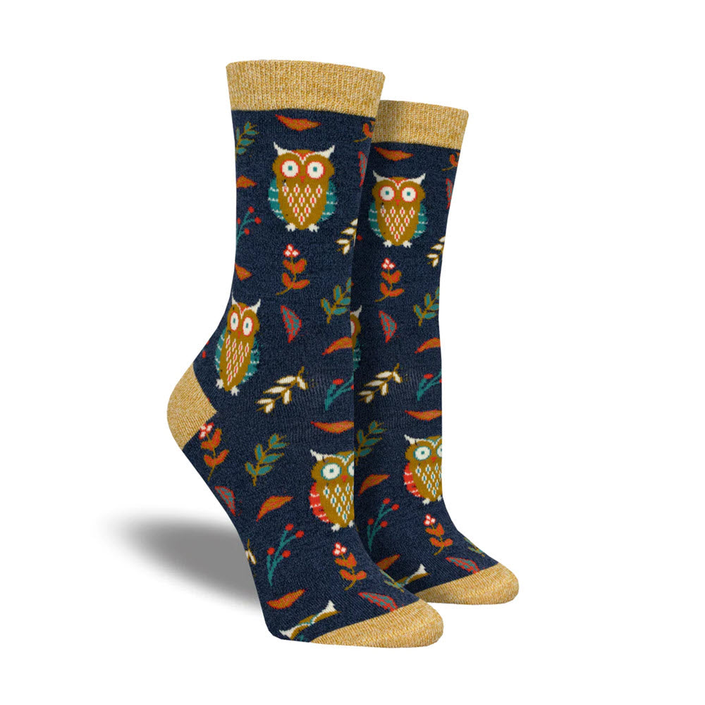 A pair of SOCKSMITH CUTE HOOT SOCKS NAVY, crafted from Rayon From Bamboo, and featuring golden yellow accents on the toes and top rim. This design is tailored for women’s shoe size.