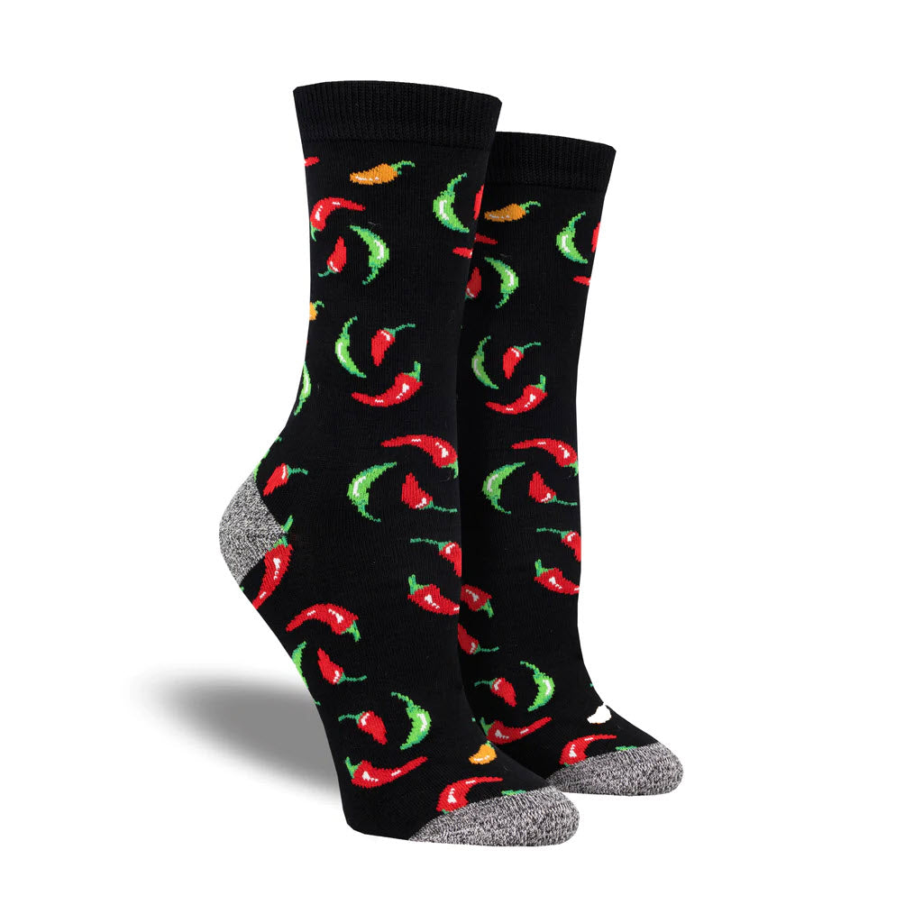 A pair of women&#39;s SOCKSMITH HOT ON YOUR HEELS SOCKS BLACK bamboo socks with chili pepper patterns and grey toes and heels.