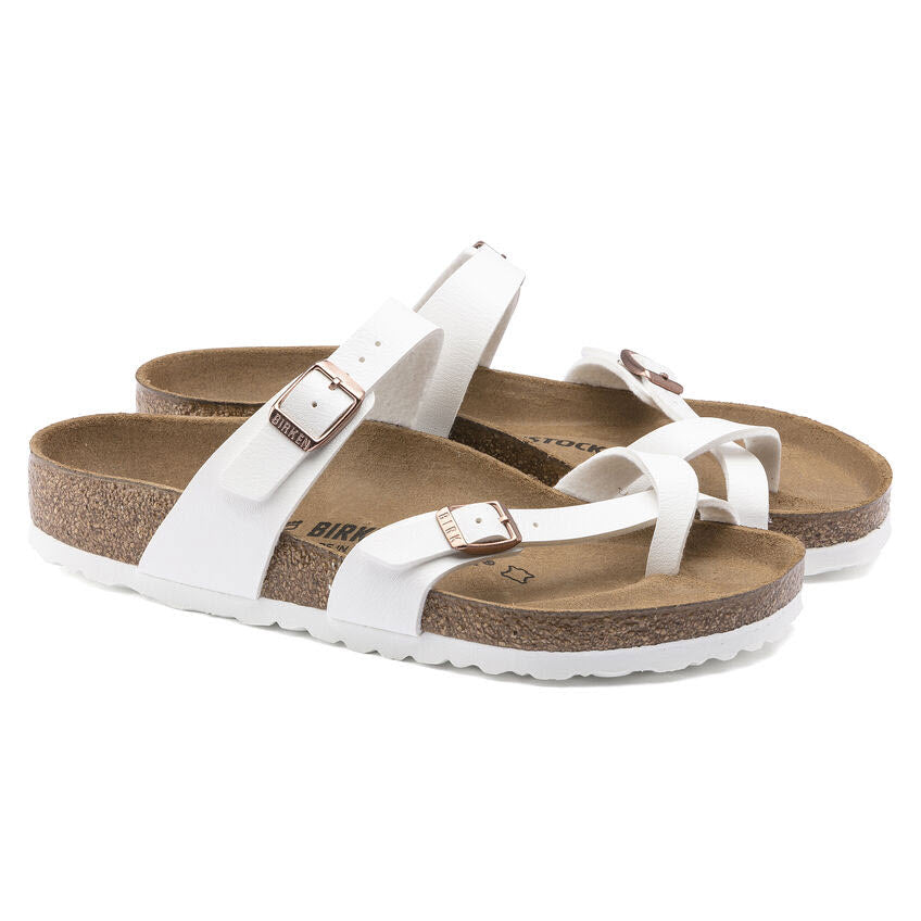 A pair of white Birkenstock Mayari sandals with buckles on a white background.