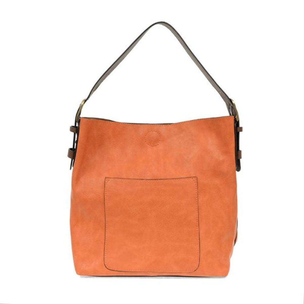 JOY SUSAN MANGO vegan leather shoulder bag with a front pocket against a white background.
