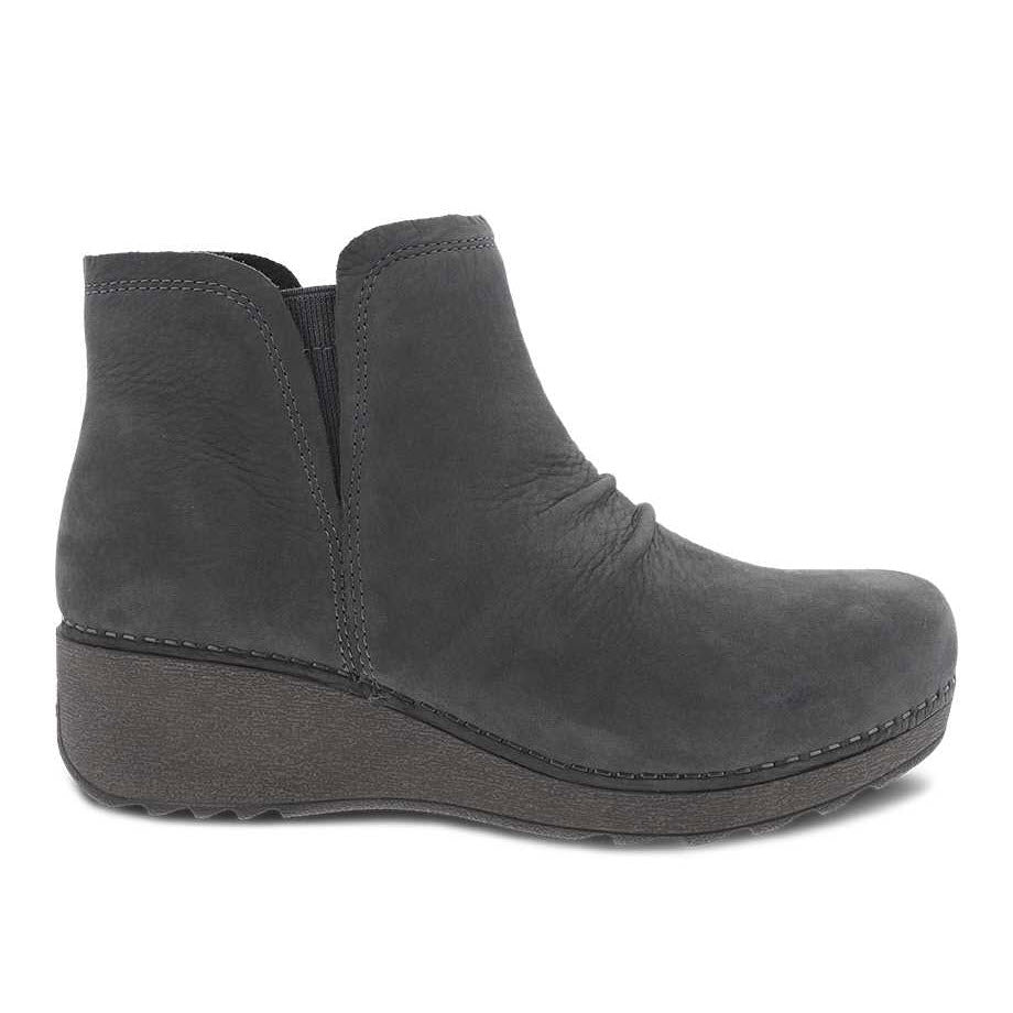 A side view of a single gray Dansko Caley ankle bootie with slight heel, stain resistance, and stitching detail.