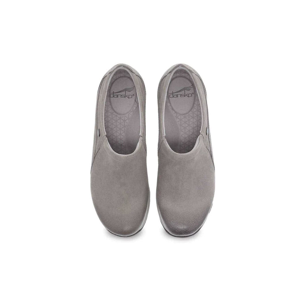 A pair of Dansko Patti Taupe Burnished slip-on shoes displayed on a white background.