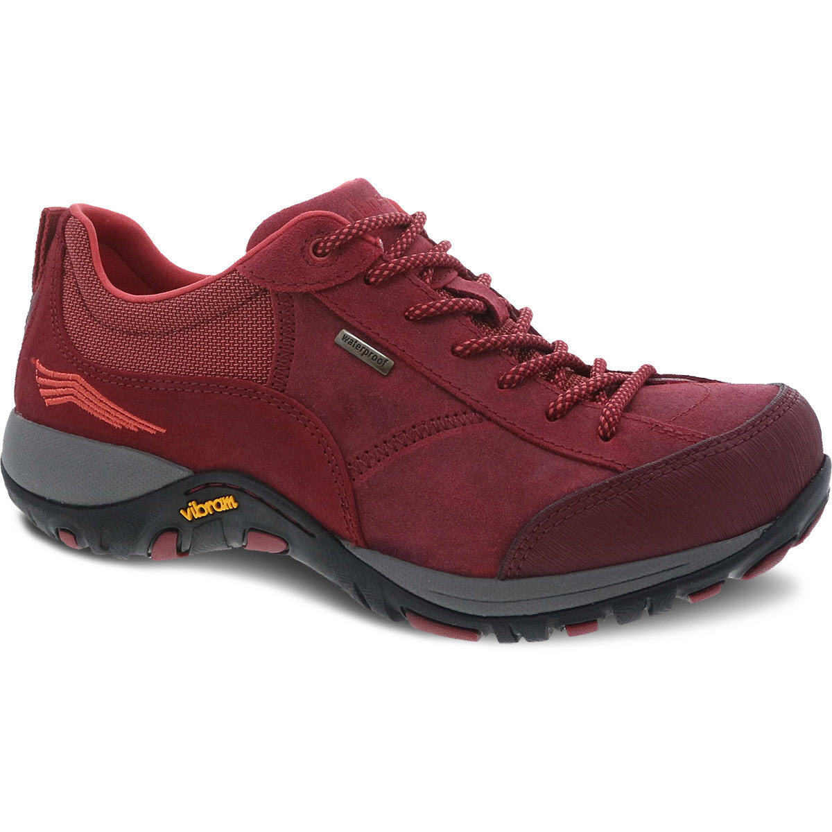 Dansko red outdoor walking shoe with a waterproof membrane and Vibram rubber outsole.