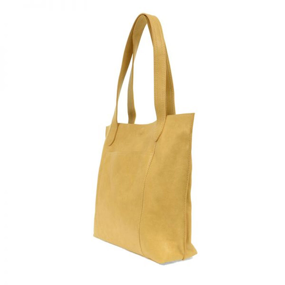 Oversized Joy Susan Taylor tote bag in Mellow Yellow with a roomy interior, displayed on a white background.
