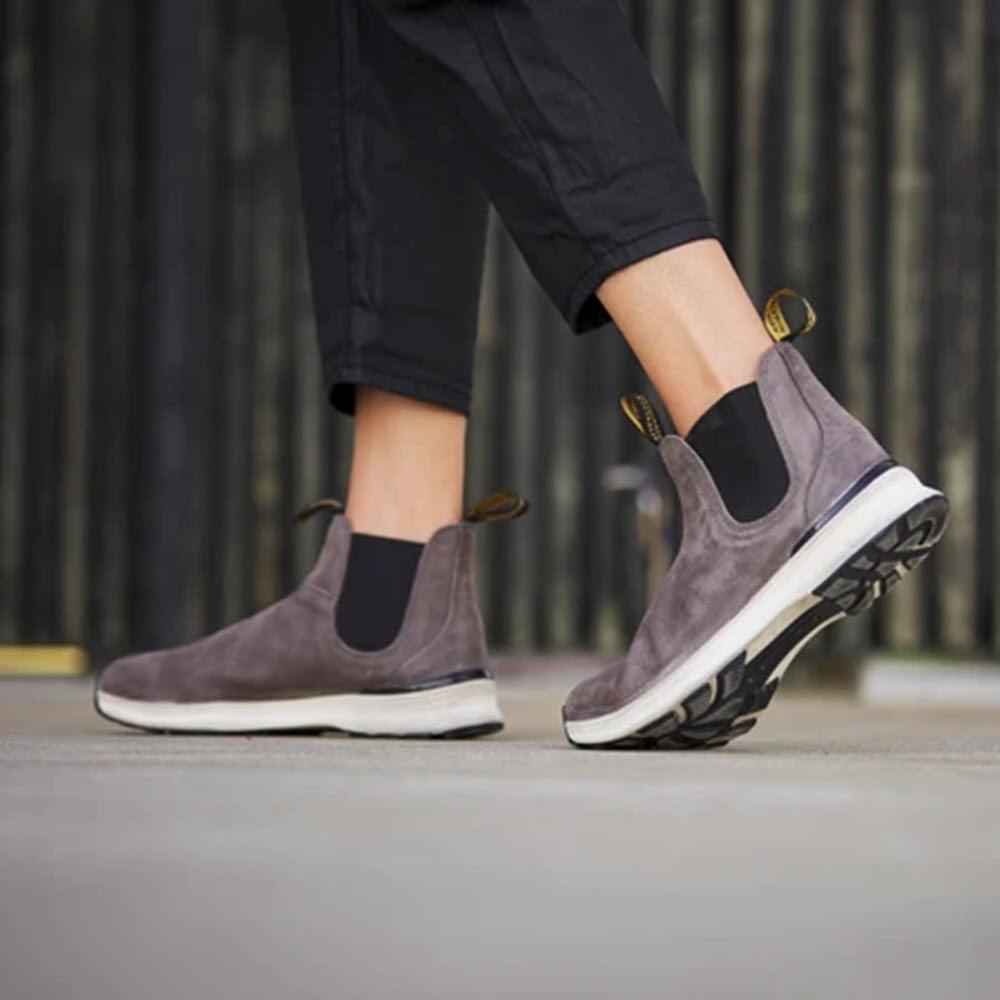 Close-up of a person walking in Blundstone Active Dusty Grey - Womens waterproof suede leather sneakers.