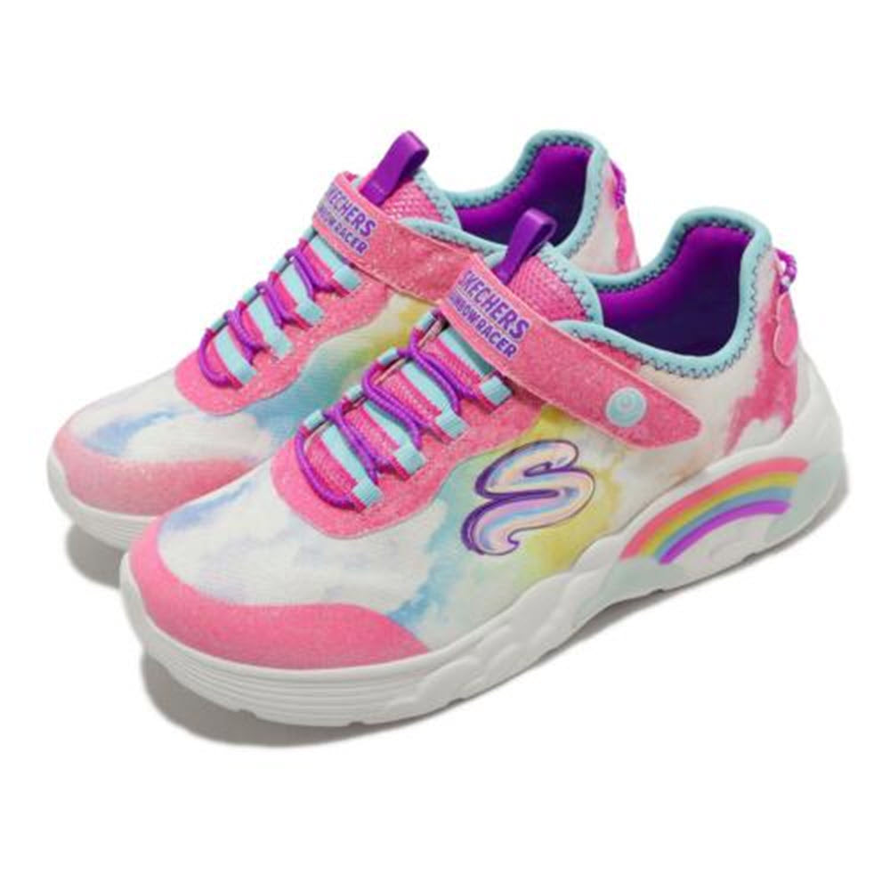 A pair of colorful Skechers Rainbow Racer Pink Multi - Kids sneakers with pink laces, rainbow designs, and a light-up midsole.