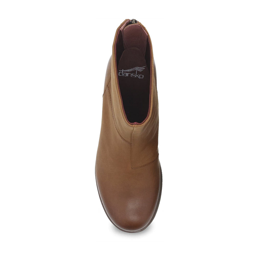 Top view of a brown leather Dansko Brianne Tan Burnished mid-height boot on a white background.