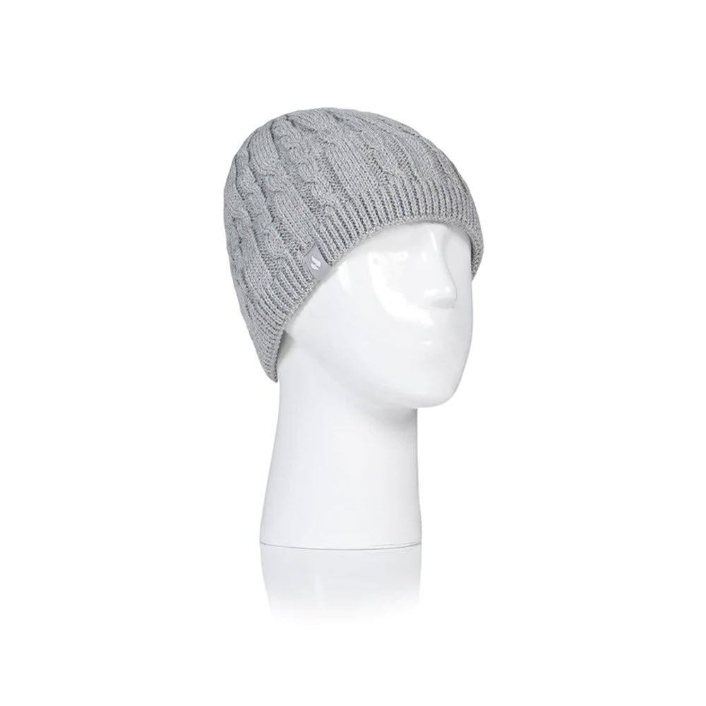 Gray knitted beanie with HeatWeaver® insulation by Heatholders, displayed on a white mannequin head, isolated on a white background.