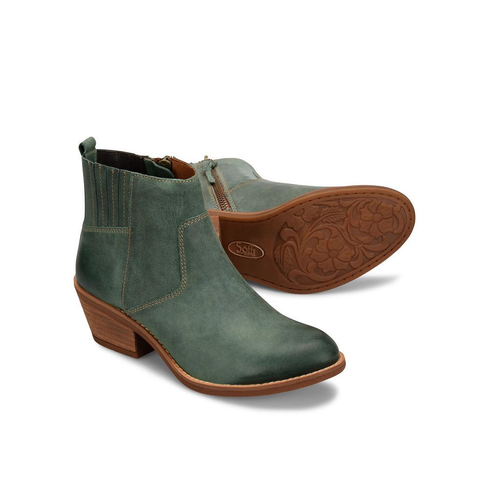A pair of green women&#39;s Sofft Ardmore Jade Chelsea ankle boots with a low heel and a hand-burnished finish on a white background.