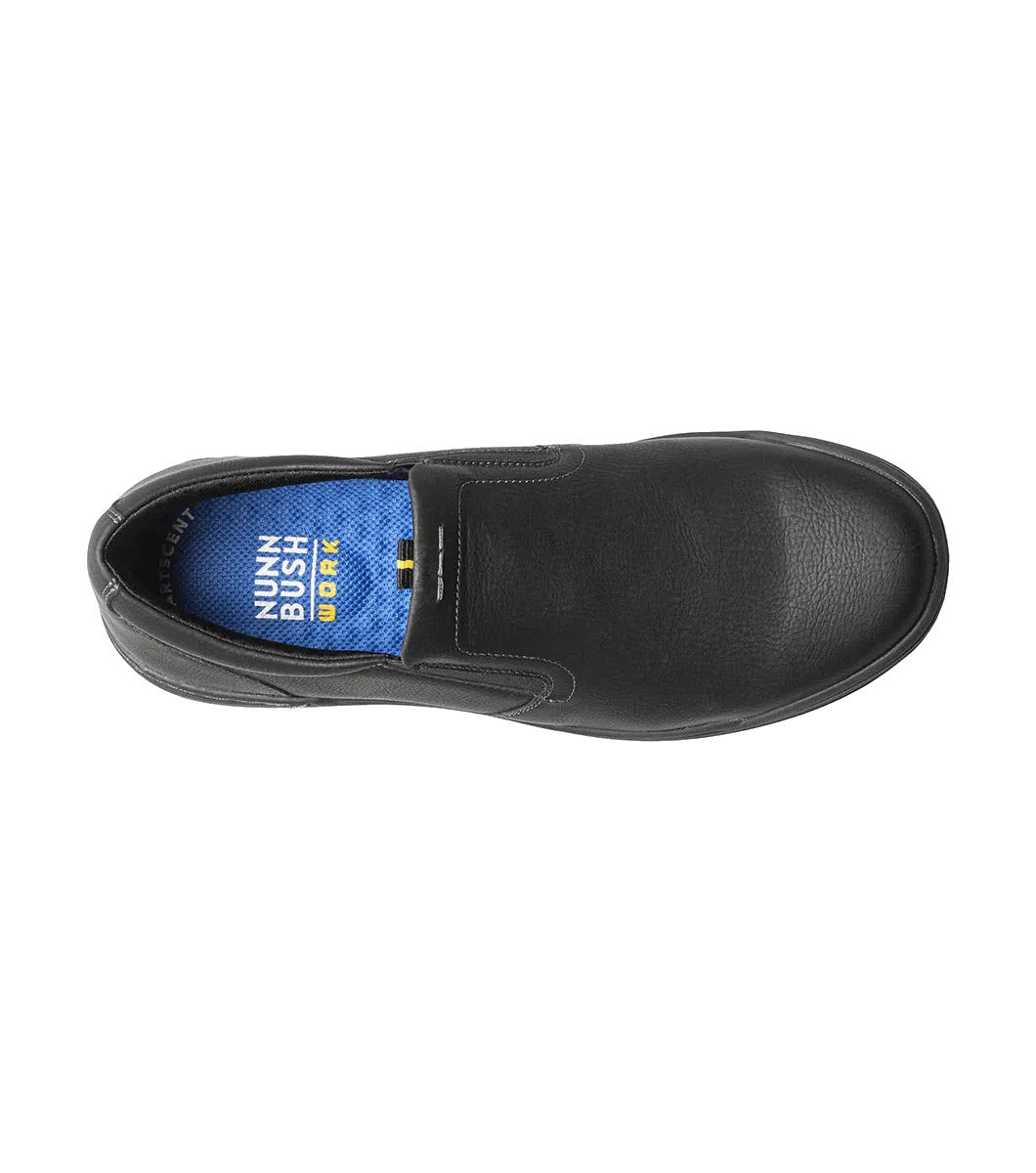 Top view of a single black Nunn Bush Tour Work Plain Toe slip-on shoe with a blue interior lining.