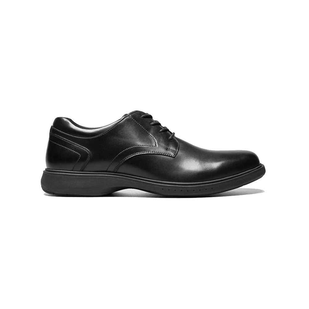 Nunn Bush Black leather Kore Pro Plain Toe Oxford dress shoe isolated on a white background.