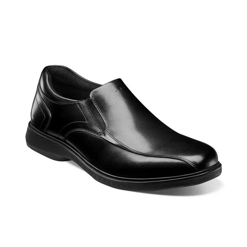 Nunn Bush black slip-on dress shoe with Memory Foam footbed on a white background.
