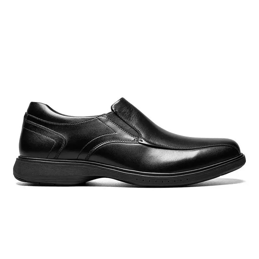 Black leather Nunn Bush KORE PRO Bike Toe Slip On dress shoe on a white background, featuring a genuine leather upper.