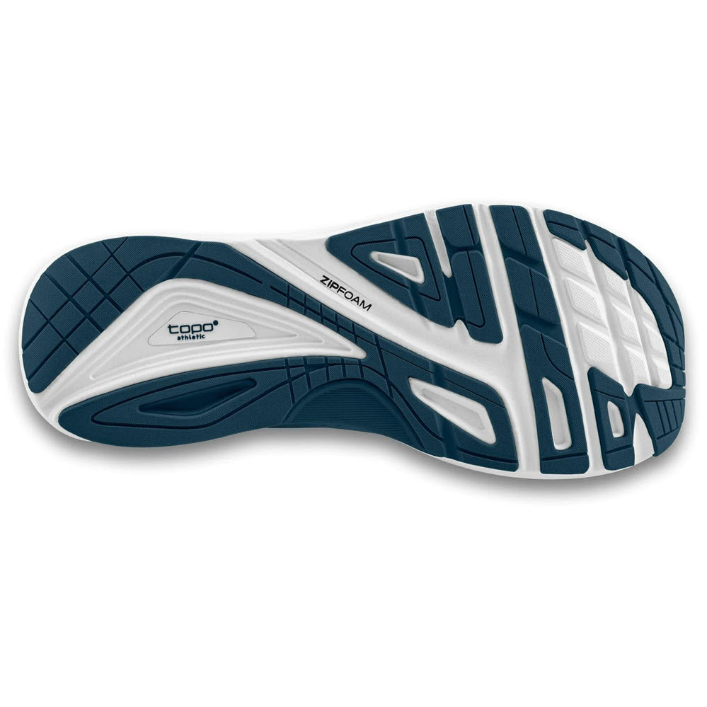 Sole of a Topo Ultrafly 4 running shoe with navy and black tread design and light stability.