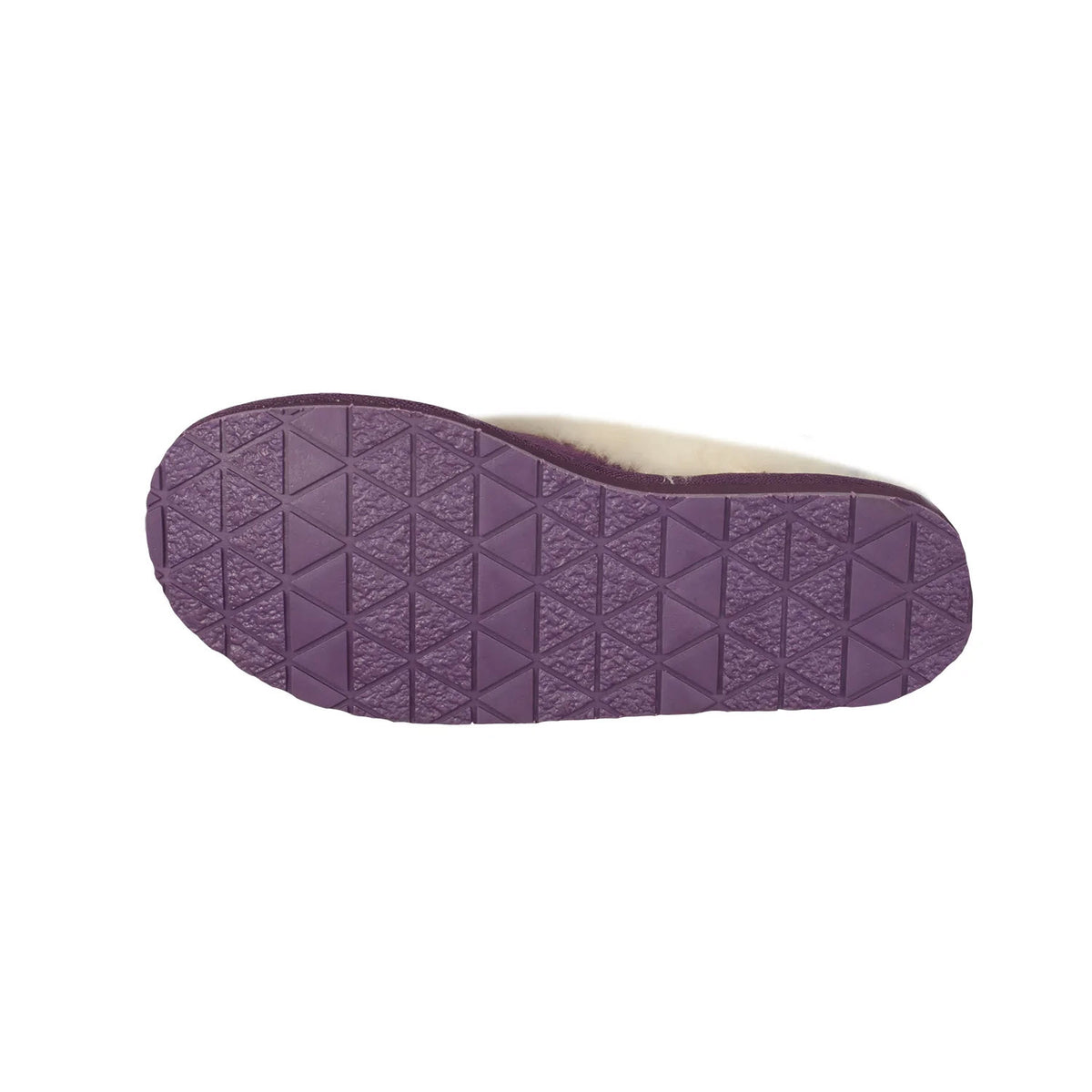 Bottom view of a Cloud Nine Ladies Scuff Purple slipper sliding into a textured sole and sheepskin lining, isolated on a white background.