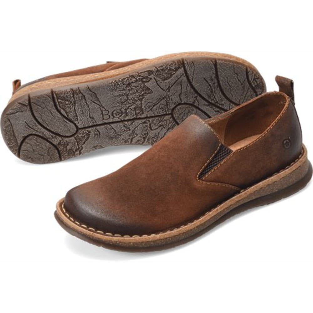 A pair of brown leather Born Bryson slip-on shoes with hand-stitched construction and an embossed sole.