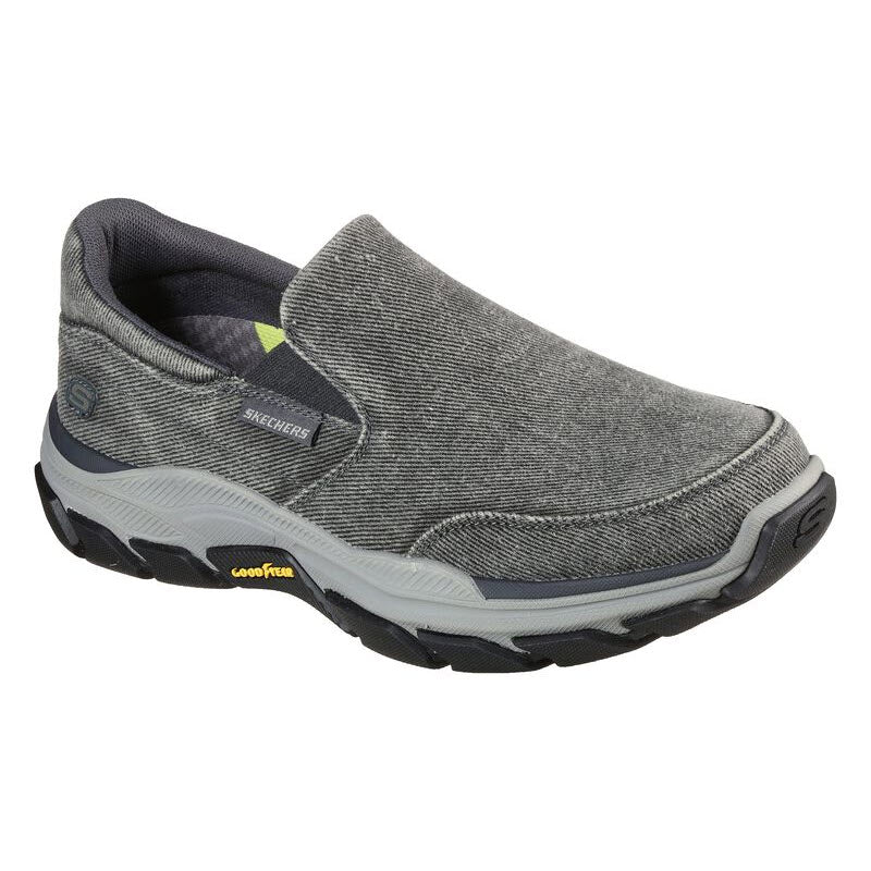 A single gray Skechers FALSTON CHARCOAL CANVAS slip-on sneaker with a white sole.