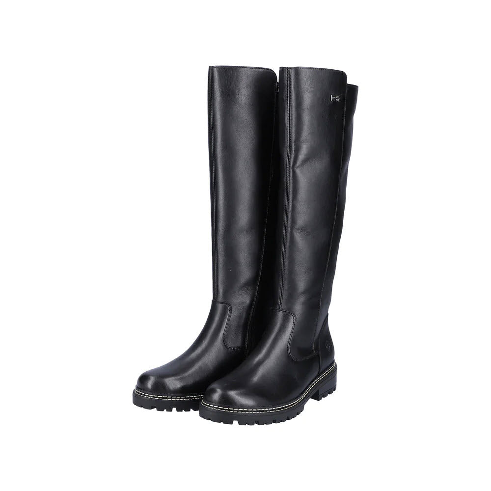 A pair of REMONTE LUG SOLE TALL BOOT BLACK - WOMENS, perfect as women&#39;s Tall Waterproof Boot by Remonte.