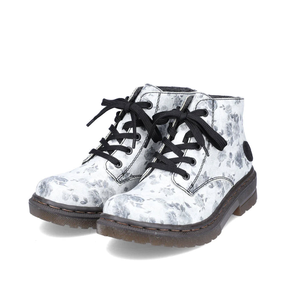 A pair of RIEKER COMBAT BOOTIE MINI BLACK FLORAL lace-up low boots with black soles and laces, shown on a white background.
